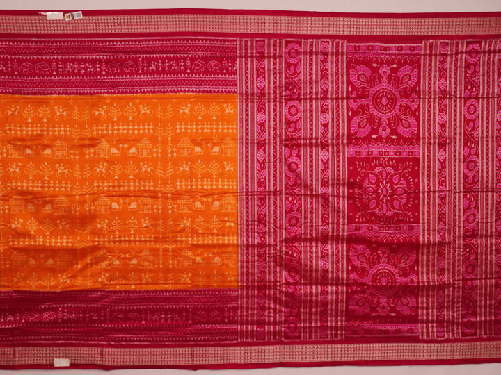 Close-up of intricate sambalpuri silk saree's yellow fabric featuring detailed motifs in rani color