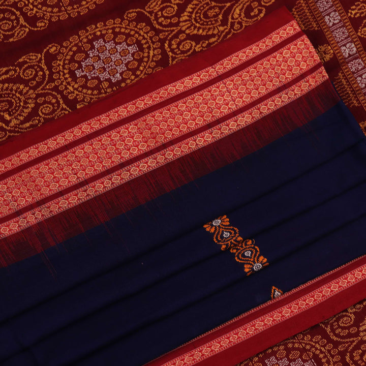 Full view of a blue and maroon Bomkai cotton saree with a butta pattern.