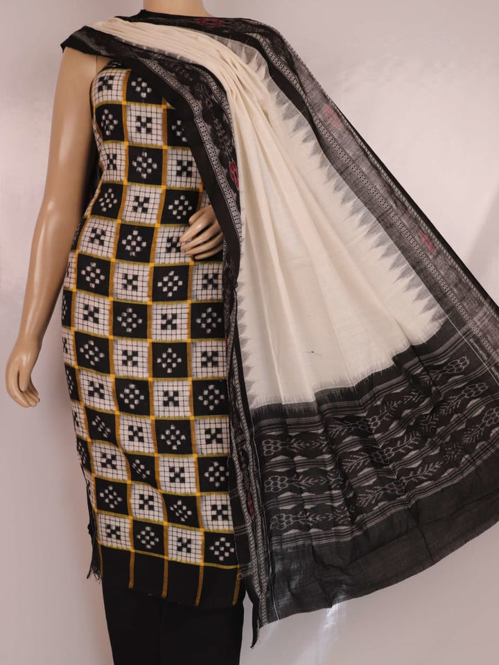 Close-up view of a black and white Sambalpuri cotton blouse piece with a Pasapalli pattern.