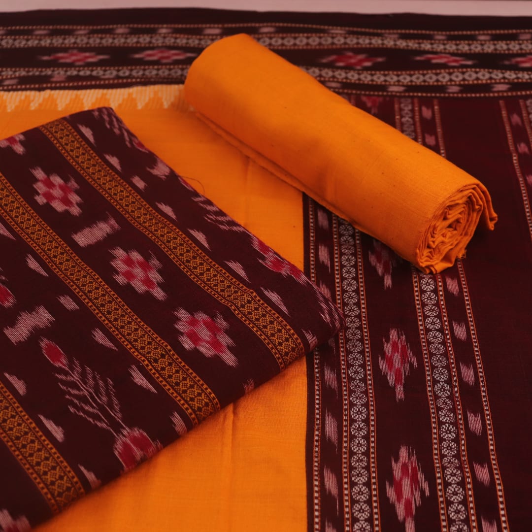 Close-up of the maroon and yellow Sambalpuri cotton blouse piece with motifs for the dress material.