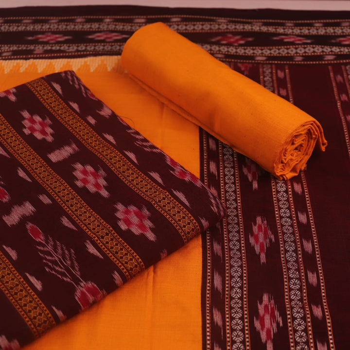 Close-up of the maroon and yellow Sambalpuri cotton blouse piece with motifs for the dress material.