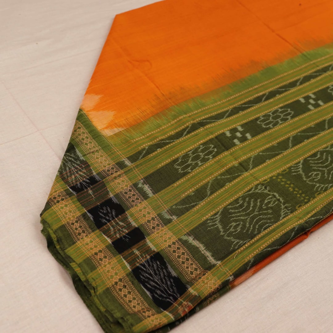 Yellow and green cotton Sambalpuri dupatta with plain body and patterned border, styled for draping