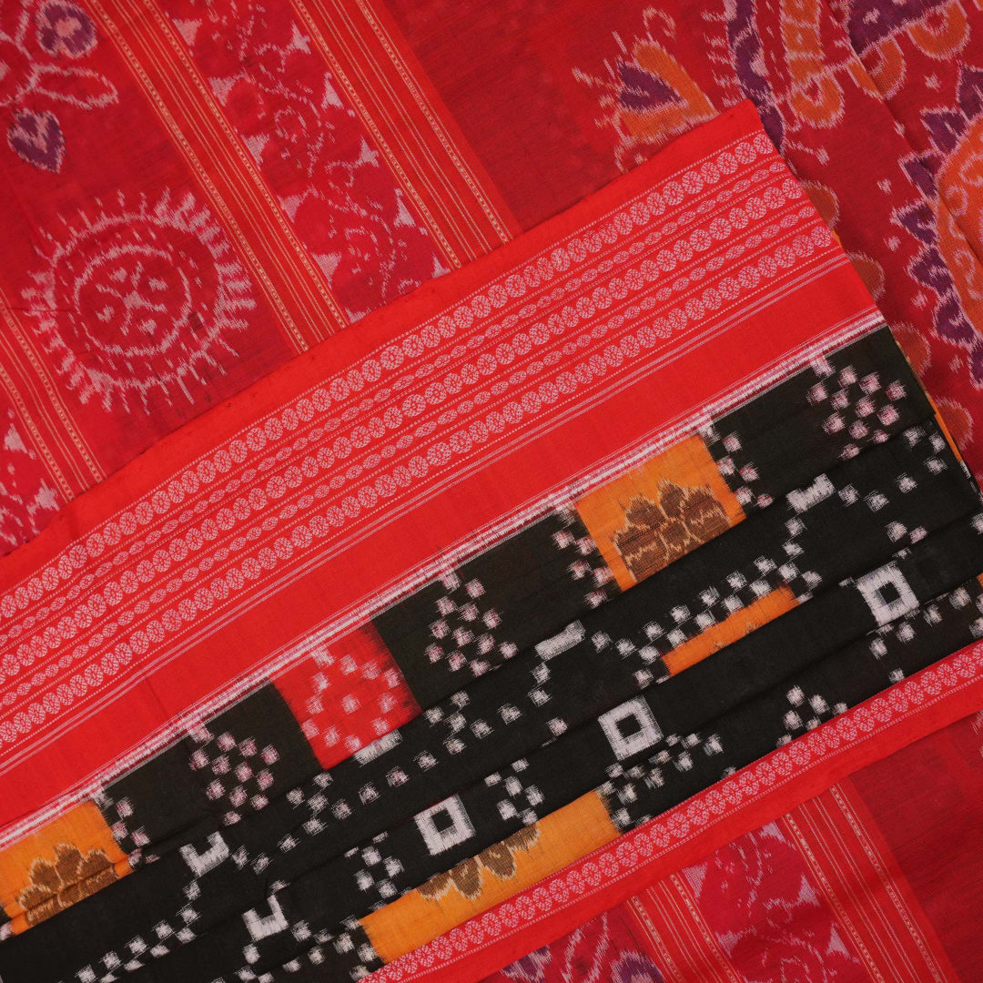 Model draped in a traditional black and red Pasapalli Sambalpuri cotton saree for an elegant ethnic look.