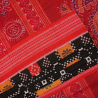 Model draped in a traditional black and red Pasapalli Sambalpuri cotton saree for an elegant ethnic look.