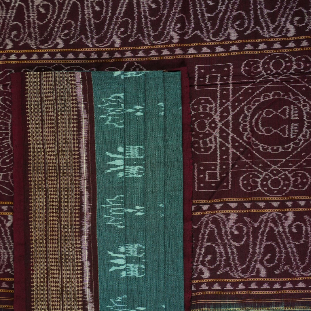 Full flat layout of green and maroon Sambalpuri cotton saree showcasing the complete body and pallu motifs.
