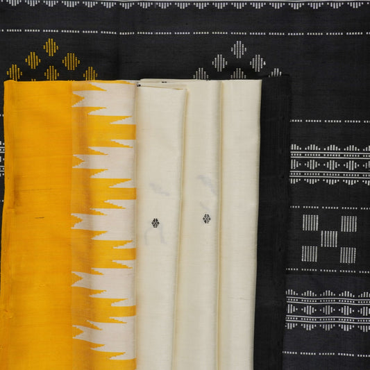 Close-up of the luxurious Berhampuri Silk Saree fabric, revealing the fine weave and soft texture.