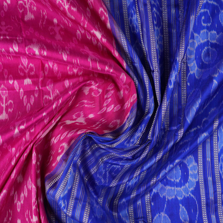 Close-up showing the luxurious handloom silk fabric texture and fine weave of the pink Sambalpuri saree.
