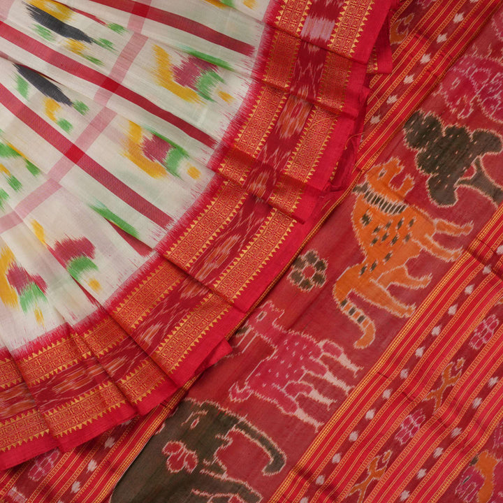 Model styled in a white and red Khandua silk saree showcasing its elegant fall and traditional Odia motifs.