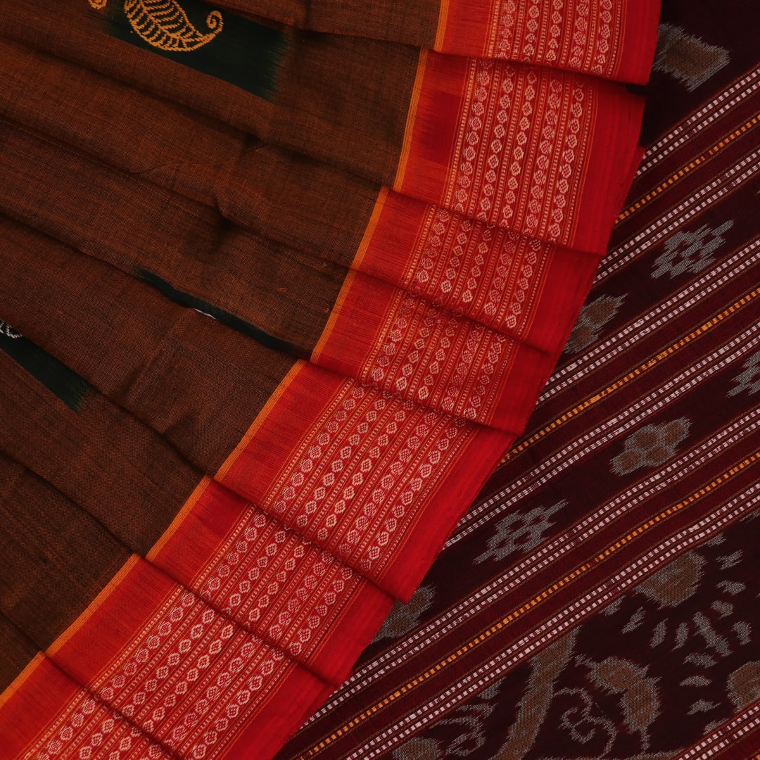 A brown and red Bomkai cotton saree with butta pattern on display