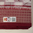 Close-up of the Sambalpuri silk saree fabric, detailing its luxurious texture and fine handloom weave.