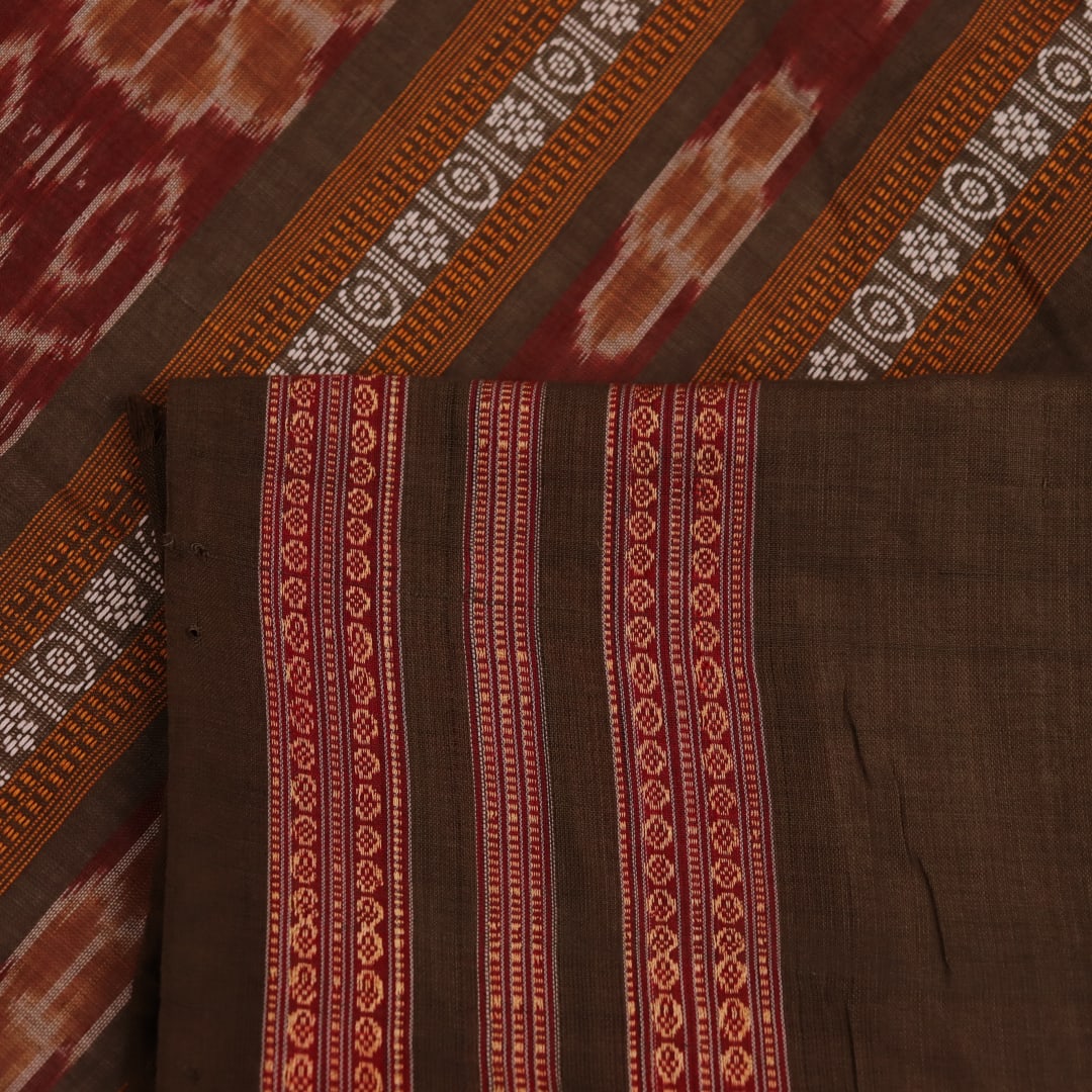 Full view of an elegant white cotton Bomkai handloom saree featuring a brown butta pattern.