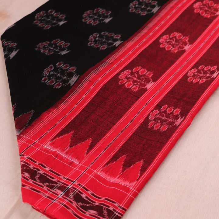 Draped view of a black and red cotton dupatta with Sambalpuri motifs