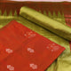 Detail of rust and green Bomkai silk blouse piece with butta pattern.