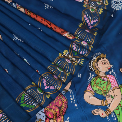 Close-up of the handwoven blue Patachitra silk saree, showcasing the detailed texture of the fabric.