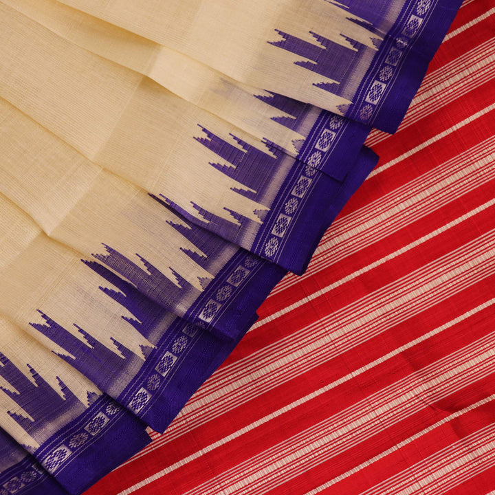 Close-up view of the intricate silk texture on a Berhampuri saree in white with a red border