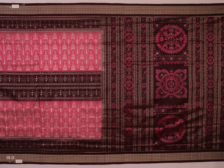 Close-up of peach and maroon Sambalpuri silk saree fabric showing intricate handloom texture and motifs.