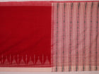 Full view of a plain red and white handloom Sambalpuri cotton saree.