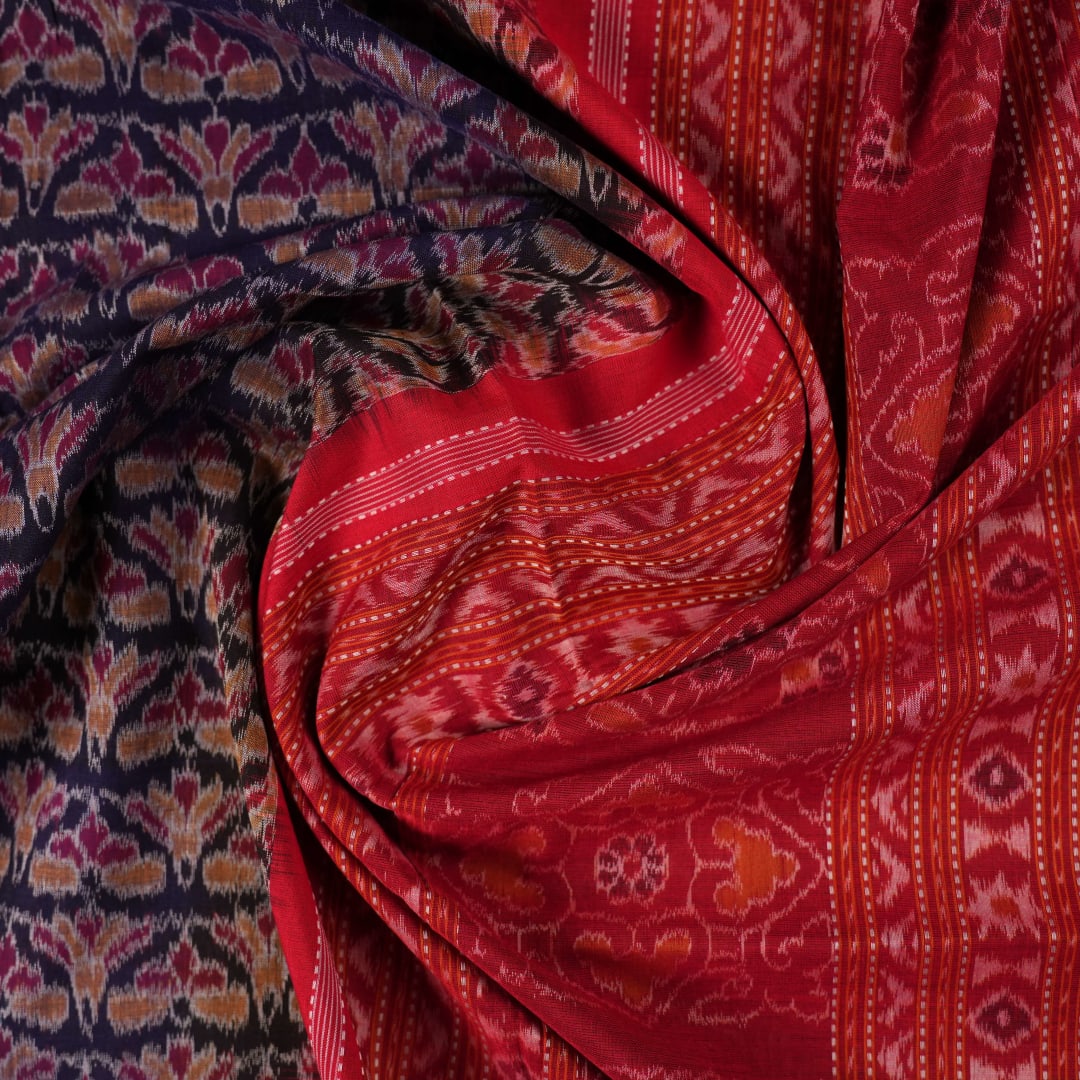 Full layout of a blue and red Sambalpuri cotton saree showcasing the complete pattern and border design.