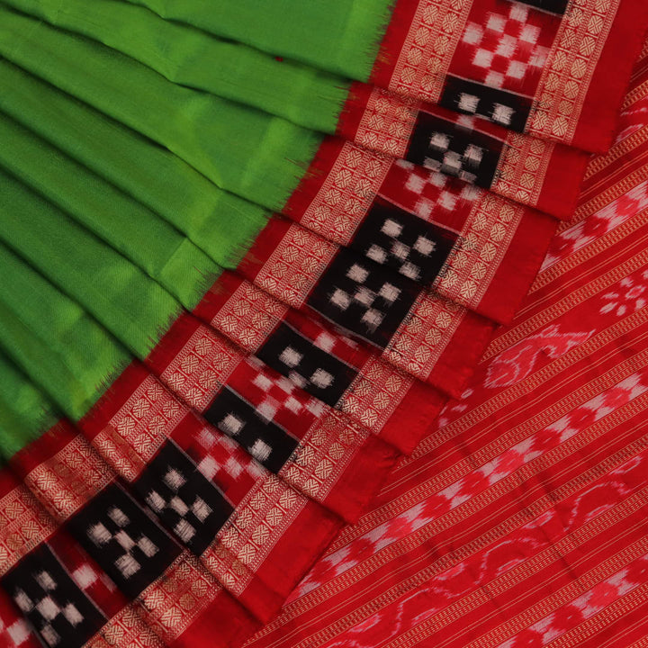 Close-up view of light green Pasapalli pattern woven on silk Sambalpuri saree fabric