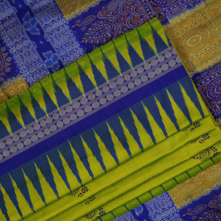 Detailed close-up of the exquisite green Bomkai Silk Saree fabric, highlighting its luxurious silk weave.