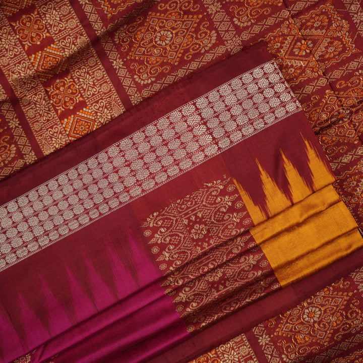 Ultra close-up of Bomkai silk saree fabric, revealing its luxurious texture and fine handloom weave.