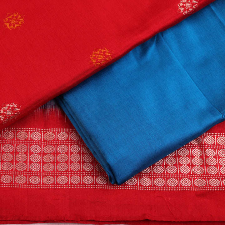 Red and blue Bomkai silk blouse piece with butta pattern.