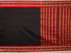 Close-up of black and red striped Sambalpuri silk saree's woven texture.