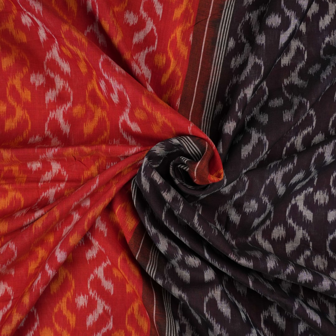 Model draped in a maroon and black Sambalpuri cotton saree showcasing elegant traditional handloom style