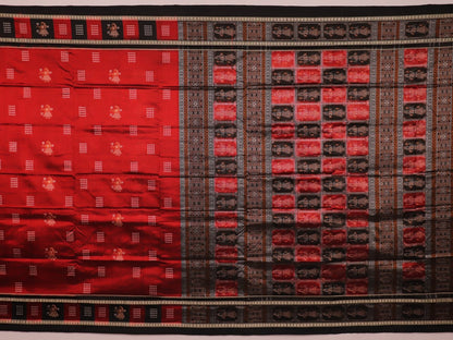 Close-up of maroon silk fabric with delicate butta patterns in black.