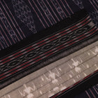 Styled Grey and Black Sambalpuri Cotton Saree with motifs, showcased draped.