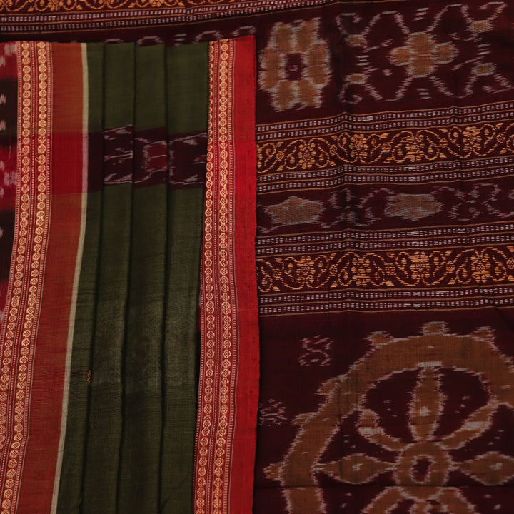 Full view of a green and rust cotton Bomkai saree with traditional butta patterns.