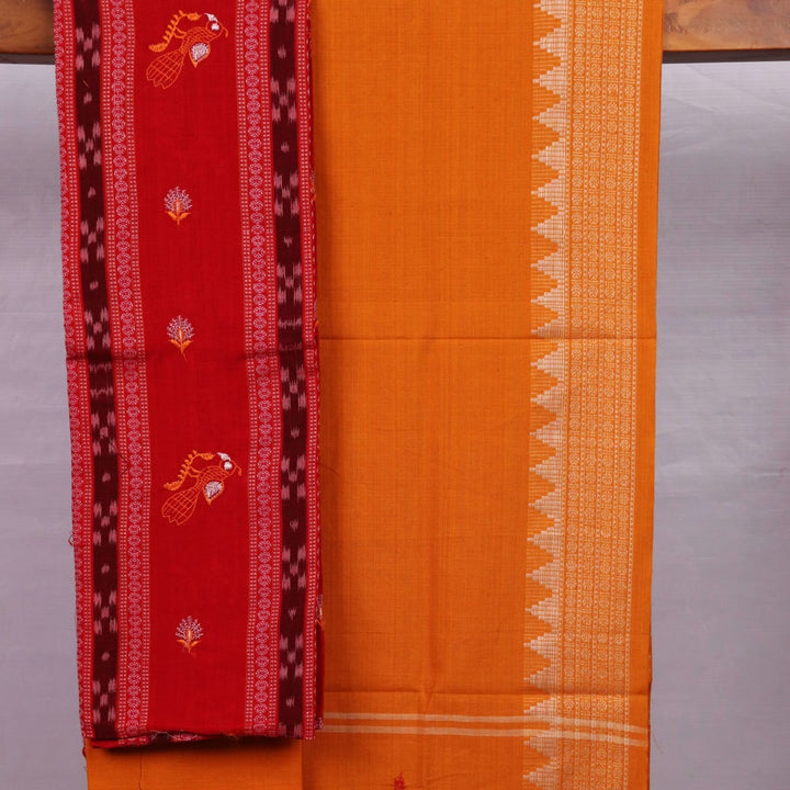 Close-up view of Red and Yellow Cotton Sambalpuri Dress Material blouse piece design with intricate motifs