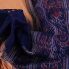 Cream cotton Bomkai saree with blue butta pattern, full view.
