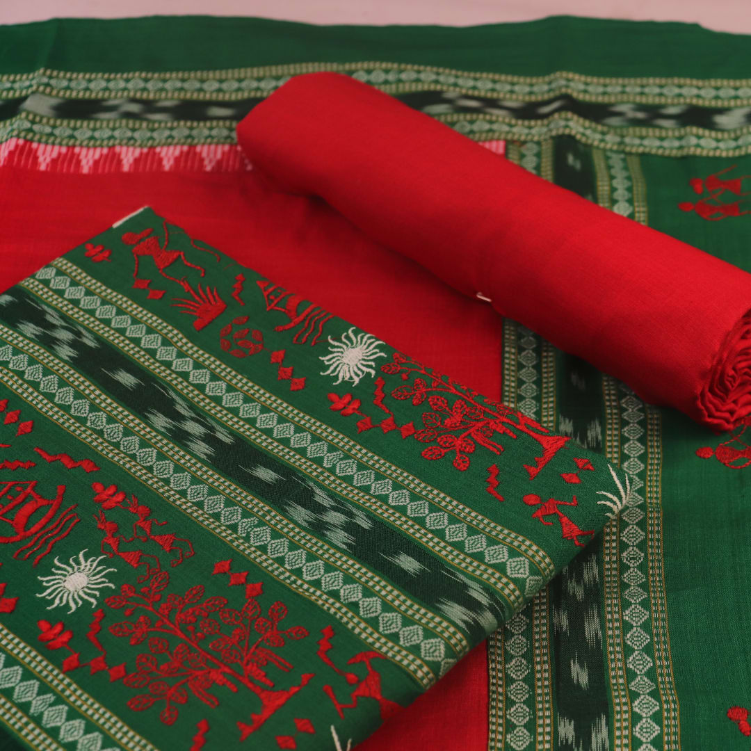Detail of the green and red Sambalpuri cotton dress material blouse piece with motifs.