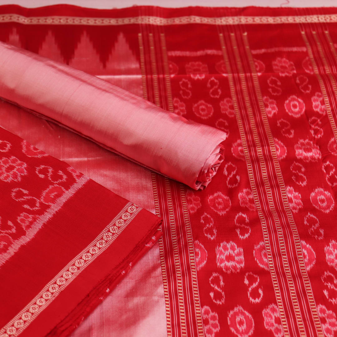 Detail of red and peach Sambalpuri Silk dress material blouse piece with motifs.