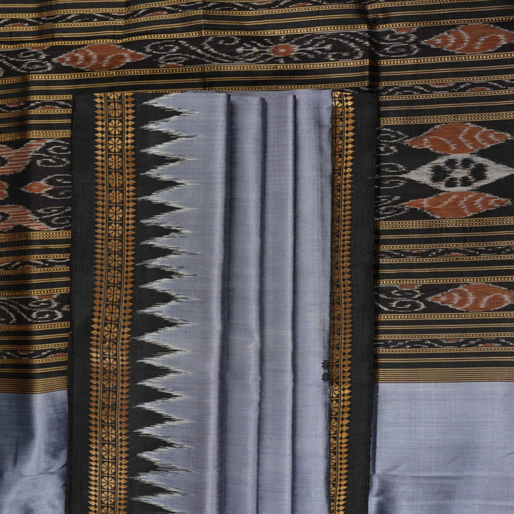 Full styling view of a model wearing a grey and black Khandua silk saree featuring elegant butta motifs.