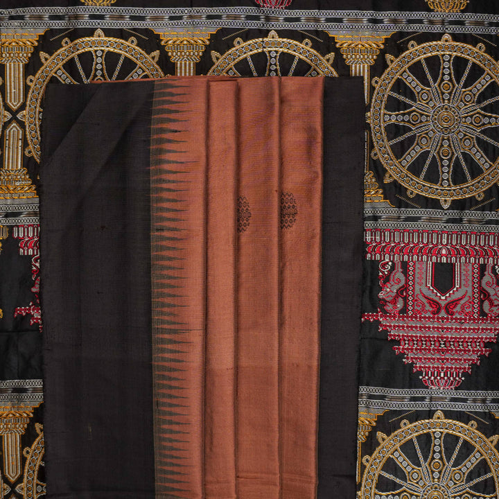 Extreme close-up of brown Bomkai silk saree fabric, revealing rich weave texture and luxurious feel.