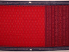 Red and blue Sambalpuri cotton saree draped to show styling and overall look.