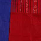 Close-up of the smooth, textured fabric of the blue Tussar silk saree.