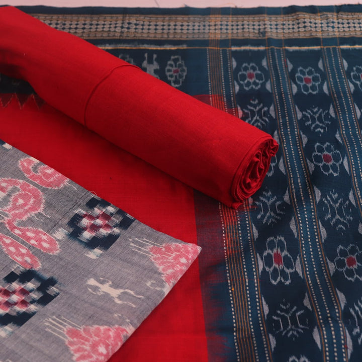 Detail of grey Sambalpuri Cotton dress material blouse piece with red motifs.