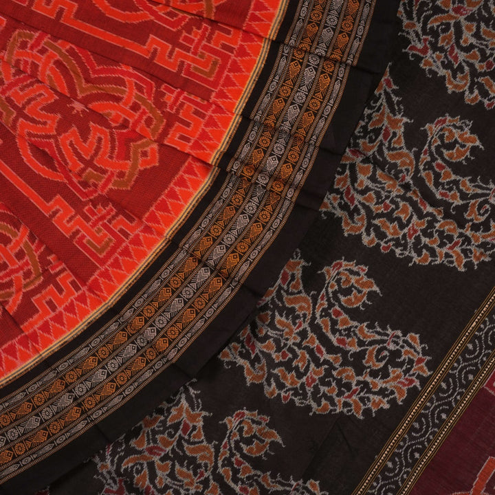 Full flat layout of the orange and black Sambalpuri cotton saree showing the body, border, and pallu