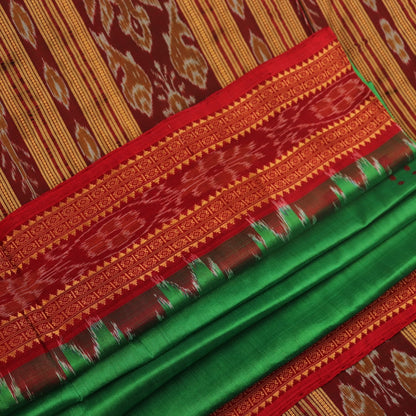 Green Khandua silk saree, styled or draped to show its overall look and fall.