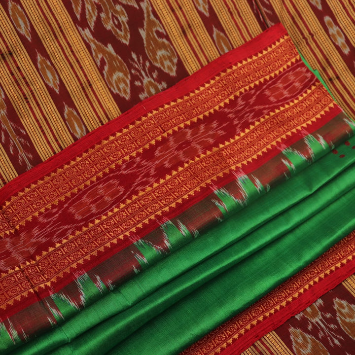 Green Khandua silk saree, styled or draped to show its overall look and fall.