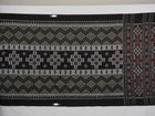 Model wearing a stylish green and black Sambalpuri cotton saree with traditional handloom woven motifs