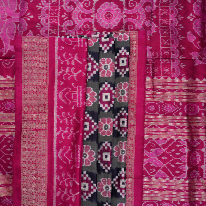 Detail of the luxurious silk texture and exquisite handloom weave of the Multi-color Pink Sambalpuri Saree.
