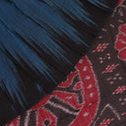 Draped plain blue and black Sambalpuri cotton saree.