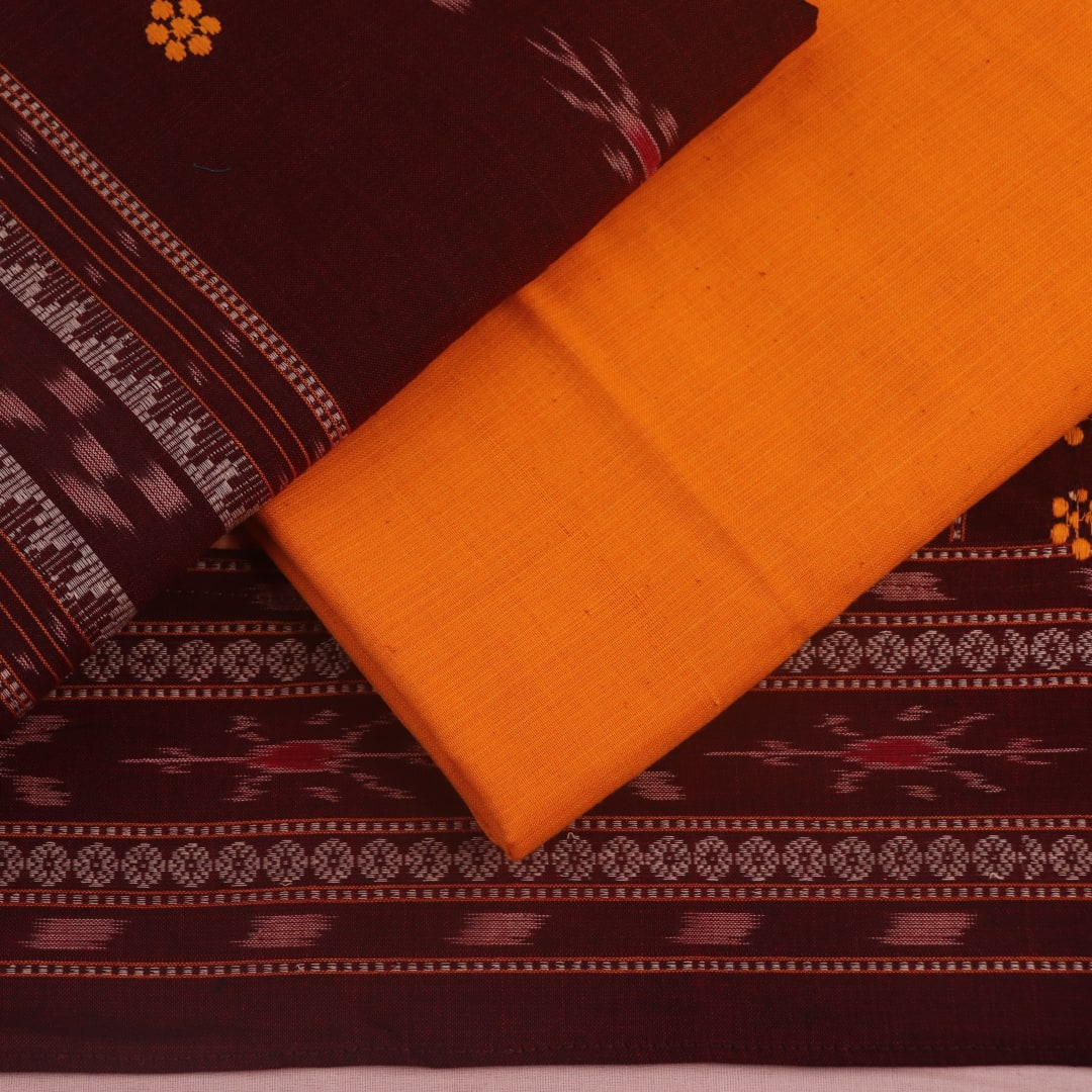 Detail of maroon & yellow Sambalpuri cotton dress material's motif-patterned blouse piece.