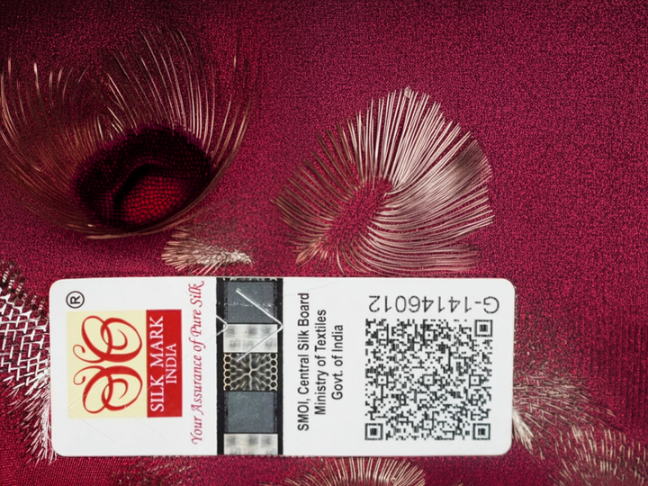 Full view of the maroon Sambalpuri silk saree with traditional motifs, displaying entire length and border.