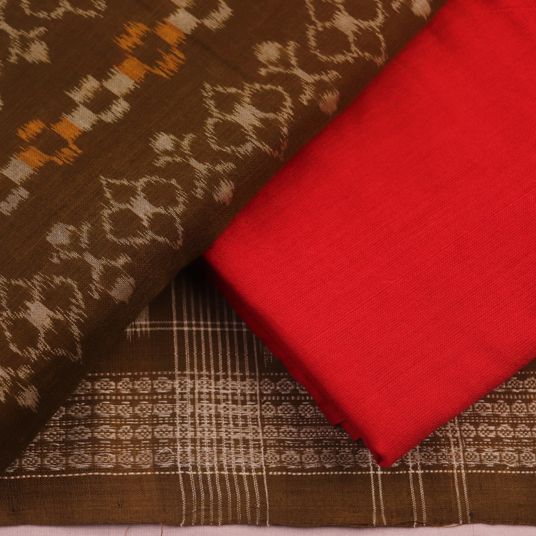 Green Sambalpuri cotton dress material blouse piece with red motifs.