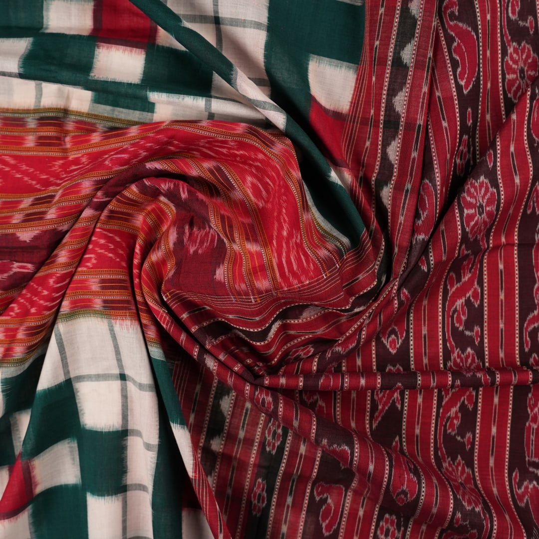 Model draped in a green and maroon pasapalli Sambalpuri cotton saree for a traditional ethnic look.